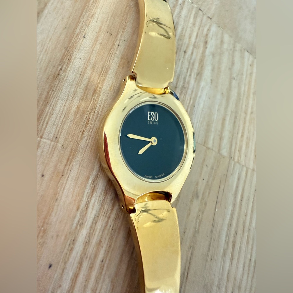 Esq Swiss by Movado ladies black dial gold tone dress watch NEW BATTERY